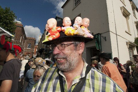 480 Bridport Hat Festival 2010 David Partridge babies hat copyright photograph by George Wright