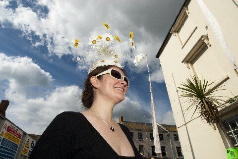 480 Bridport Hat Festival 2010 flowery hat copyright photograph by George Wright